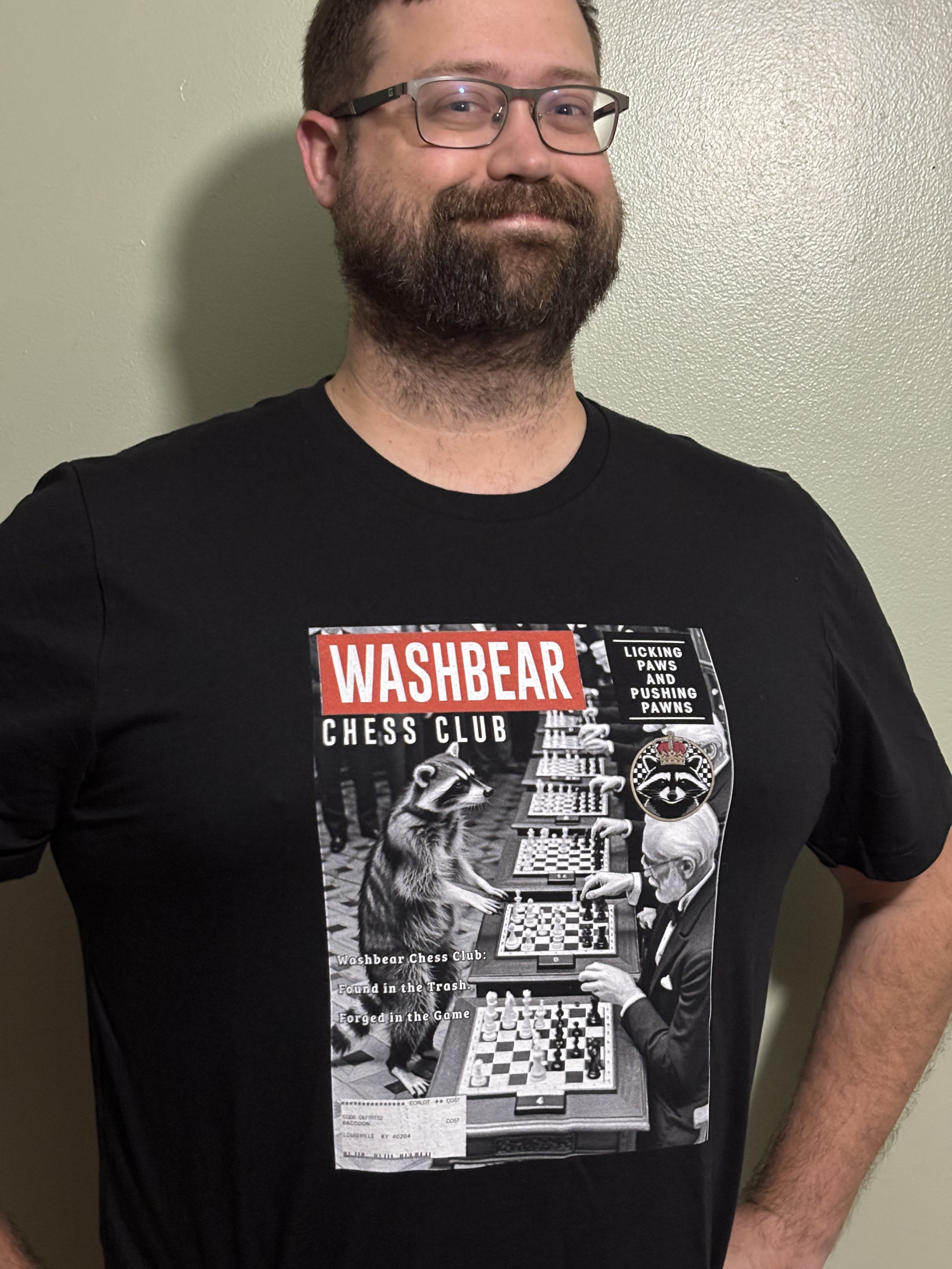 Alex modelling the chess club's Fall 2025 t-shirt design, featuring a fake 1960s style magazine cover.